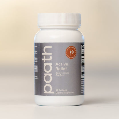 Supplement bottle labeled 'paath Active Relief' on a beige background