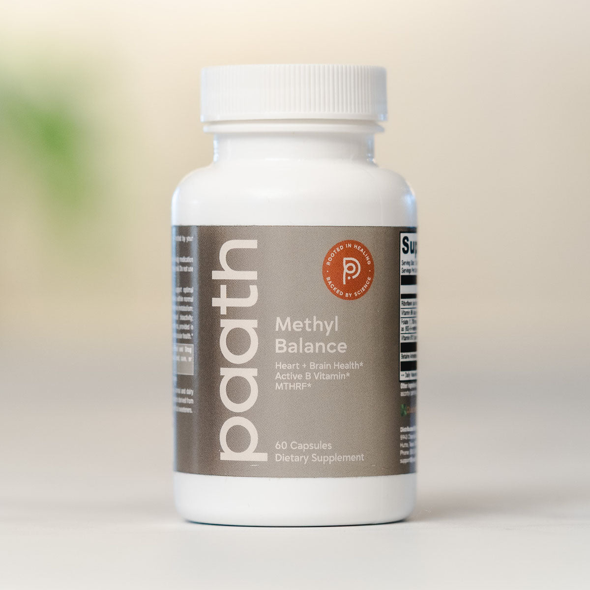 Supplement bottle labeled 'paath Methyl Balance' on a light background