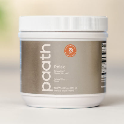 Dietary supplement container labeled 'paath' on a neutral background