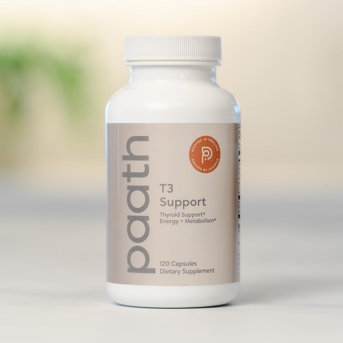 Supplement bottle labeled 'paath T3 Support' on a light background