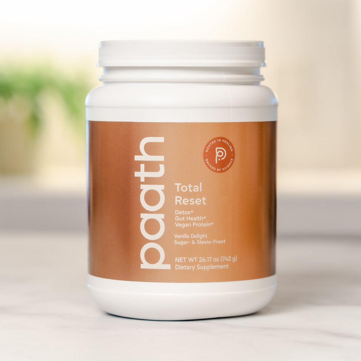 Paath Total Reset protein powder container on a light background