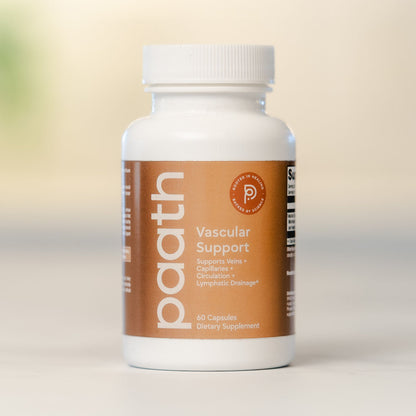 Supplement bottle labeled 'paath Vascular Support' on a light background