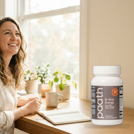 Woman clear-headed and energised at a sunlit desk in the afternoon with Paath B-Vital Energy