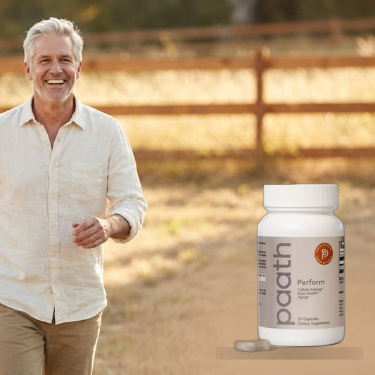 Vigorous silver-haired man walking outdoors in golden light with Paath Perform